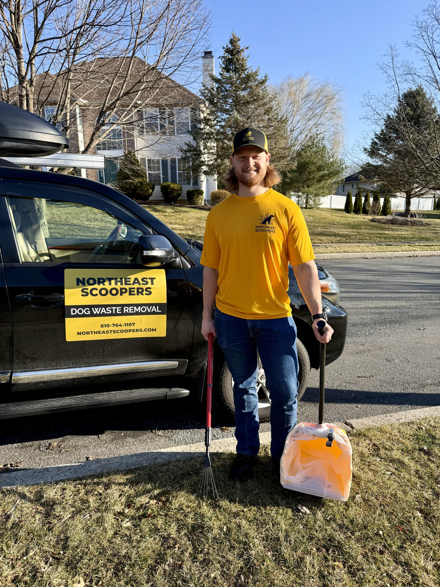Northeast Scoopers technician ready for a cleanup with equipment